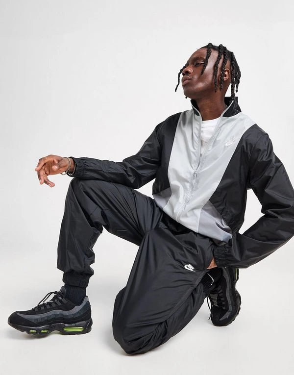 Tuta nike club woven - TedescoStore